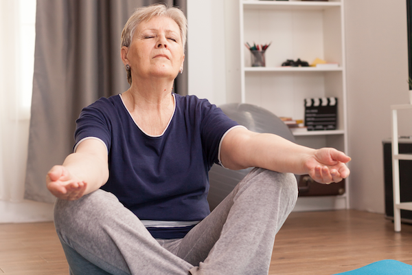 lady doing yoga at home